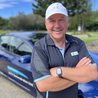 Steve from Suncatcher Security beside the branded ute